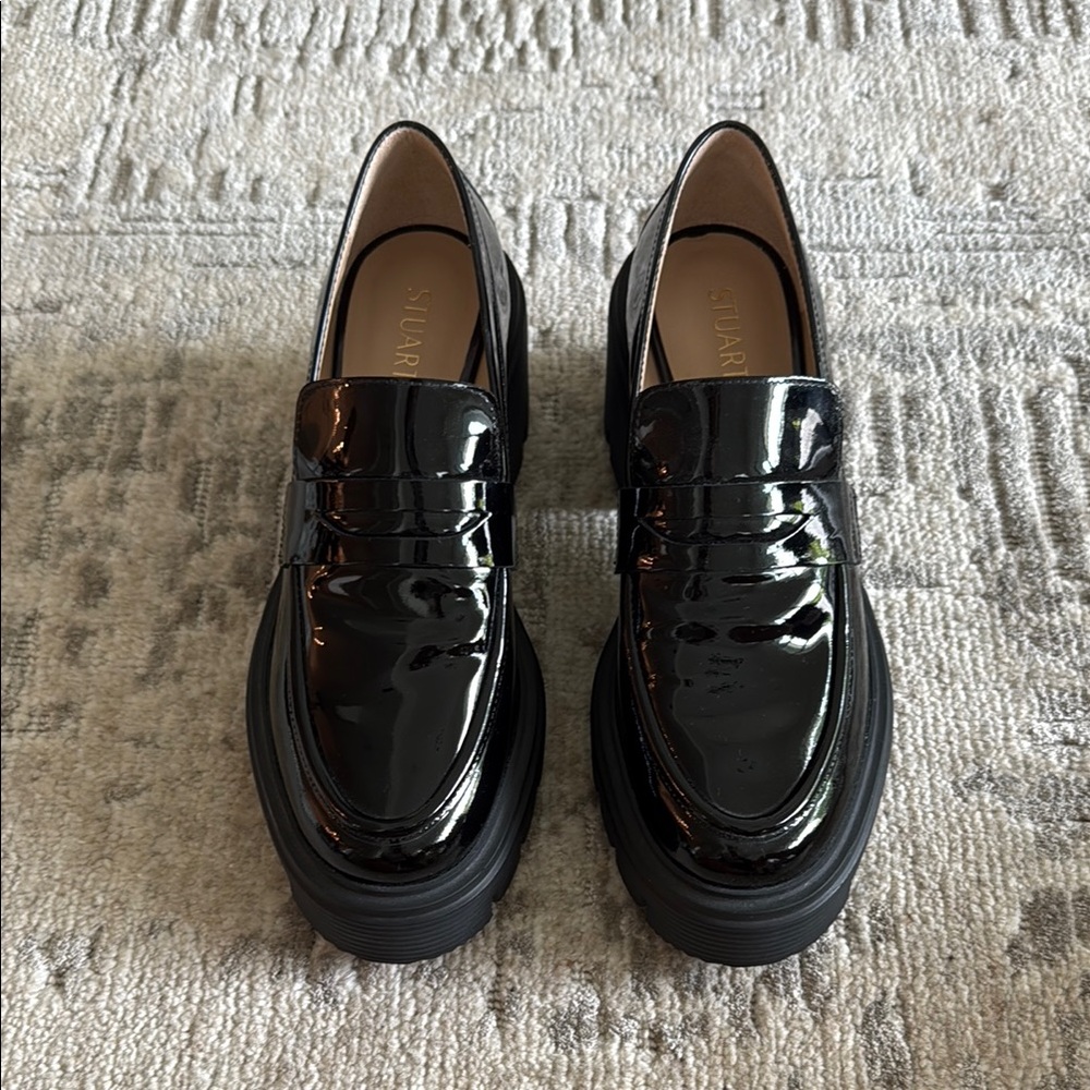 Stuart Weitzman Black Flats with Glossy Finish